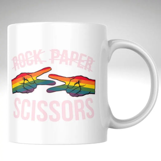 White mug with rainbow rock-paper-scissors design and text on a gray background